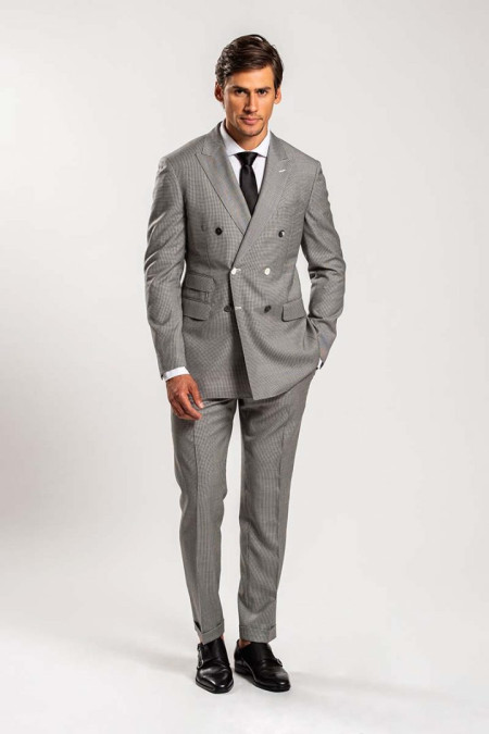 Double-breasted men suit in black and white pied de poule wool