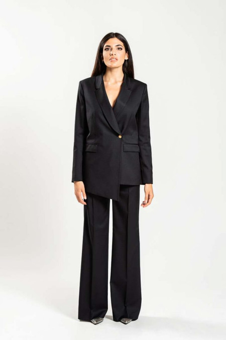 Wool women’s suit with asymmetrical cut