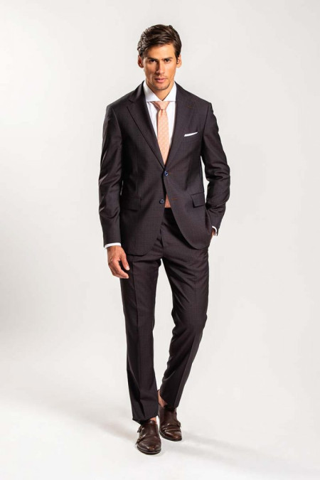 Suit in copper colored micro patterned fabric
