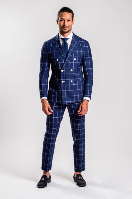 Double-breasted blue and white checked suit