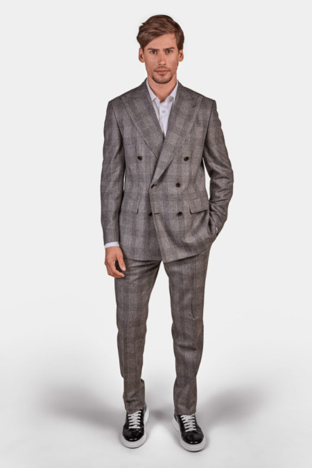 Double-breasted men’s suit in checked pattern