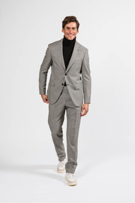 Men suit in black and white pied de poule wool